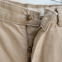 1980 Dockers distressed pleated khaki shorts, size 34