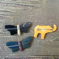 Bakelite butterfly and elephant pins, choose one