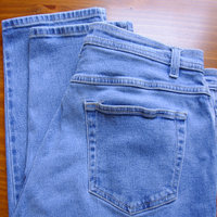 Vintage 90's light blue denim high waisted mom jeans with tapered leg, women's size 16