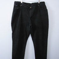 Vintage 90's high waisted black jeans with tapered leg, plus sized women's size 24 / 22