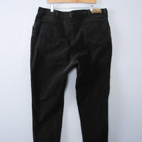 Vintage 90's high waisted black jeans with tapered leg, plus sized women's size 24 / 22