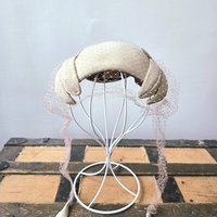 1950 Pogue's cream wool crescent fascinator hat
