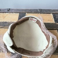 1950 Pogue's cream wool crescent fascinator hat