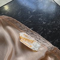 1948 peach slip dress with lace trim, size medium