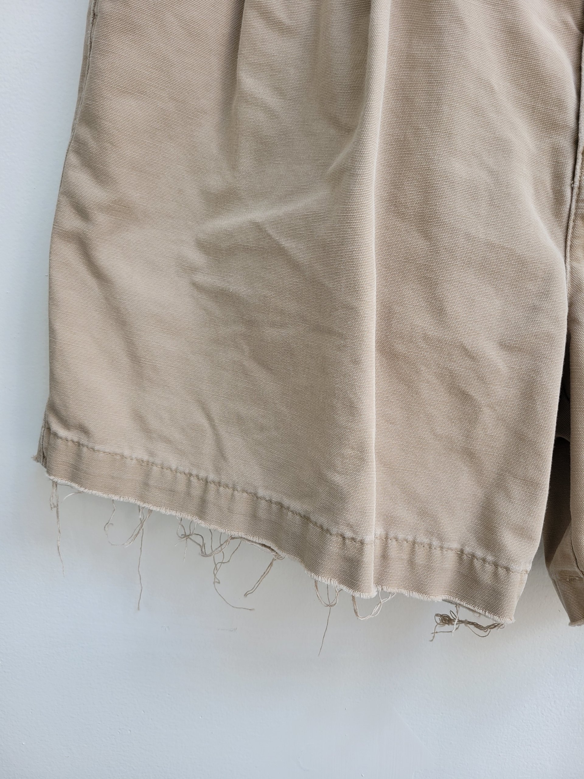 1980 Dockers distressed pleated khaki shorts, size 34