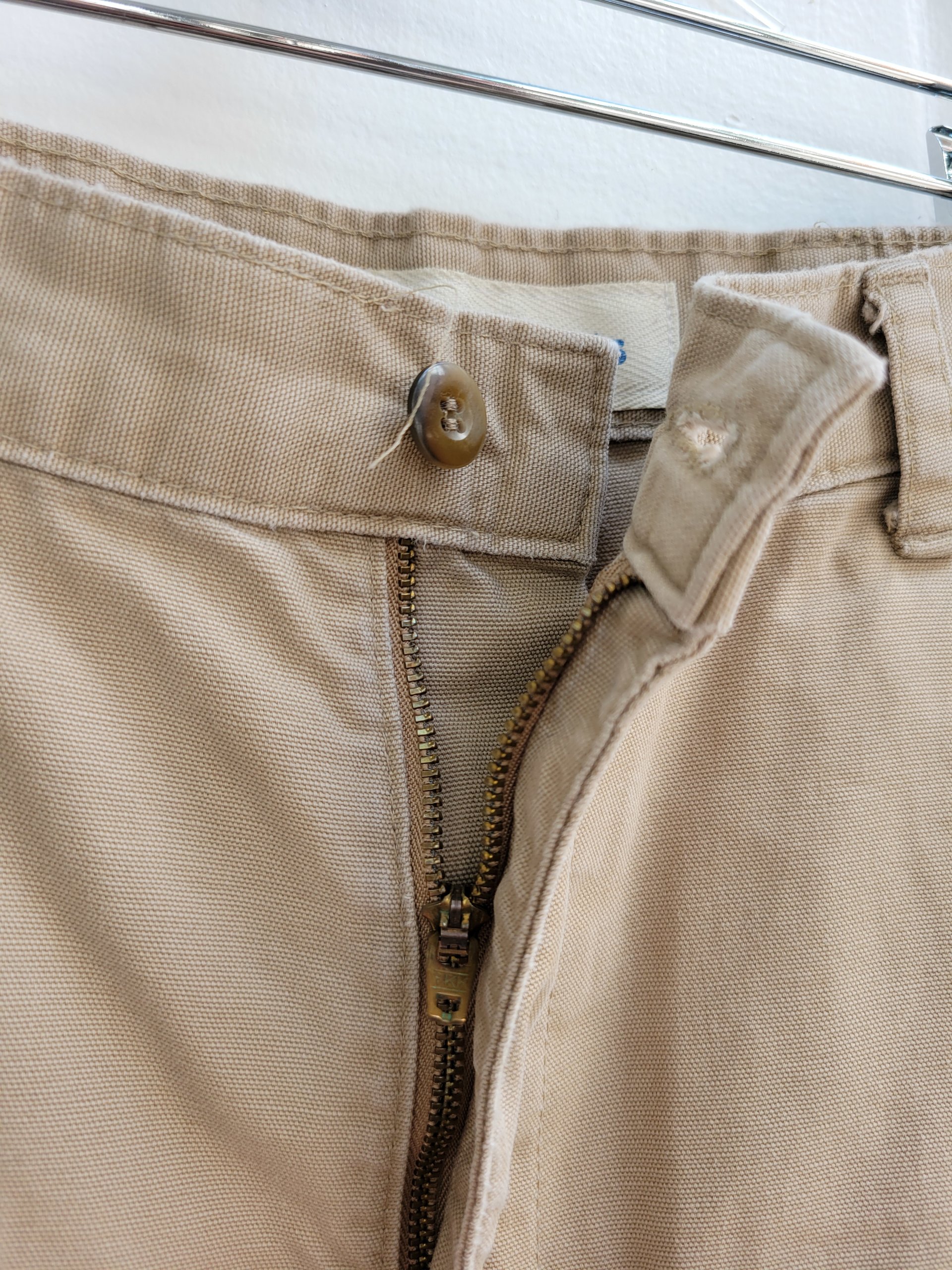 1980 Dockers distressed pleated khaki shorts, size 34