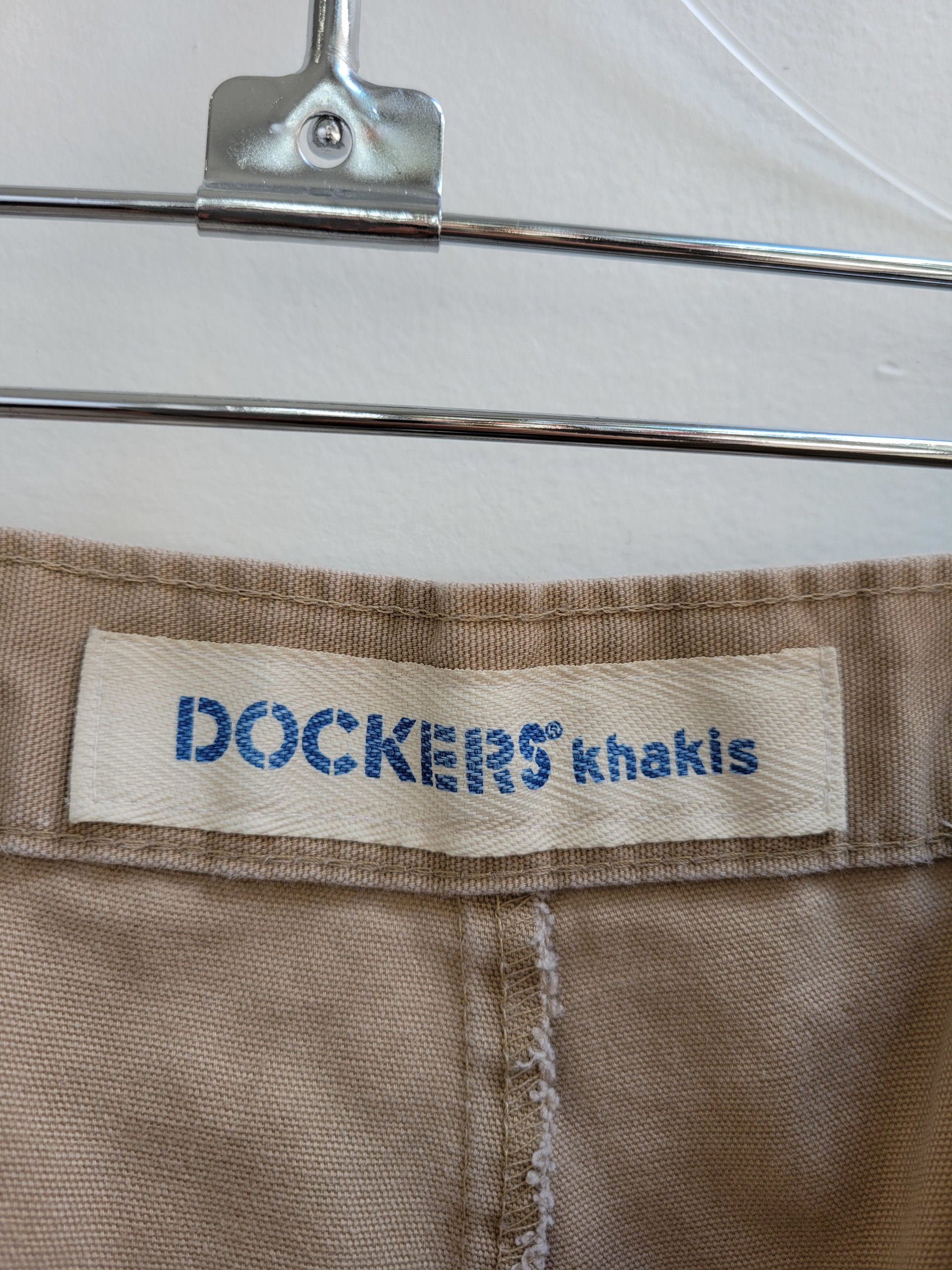 1980 Dockers distressed pleated khaki shorts, size 34