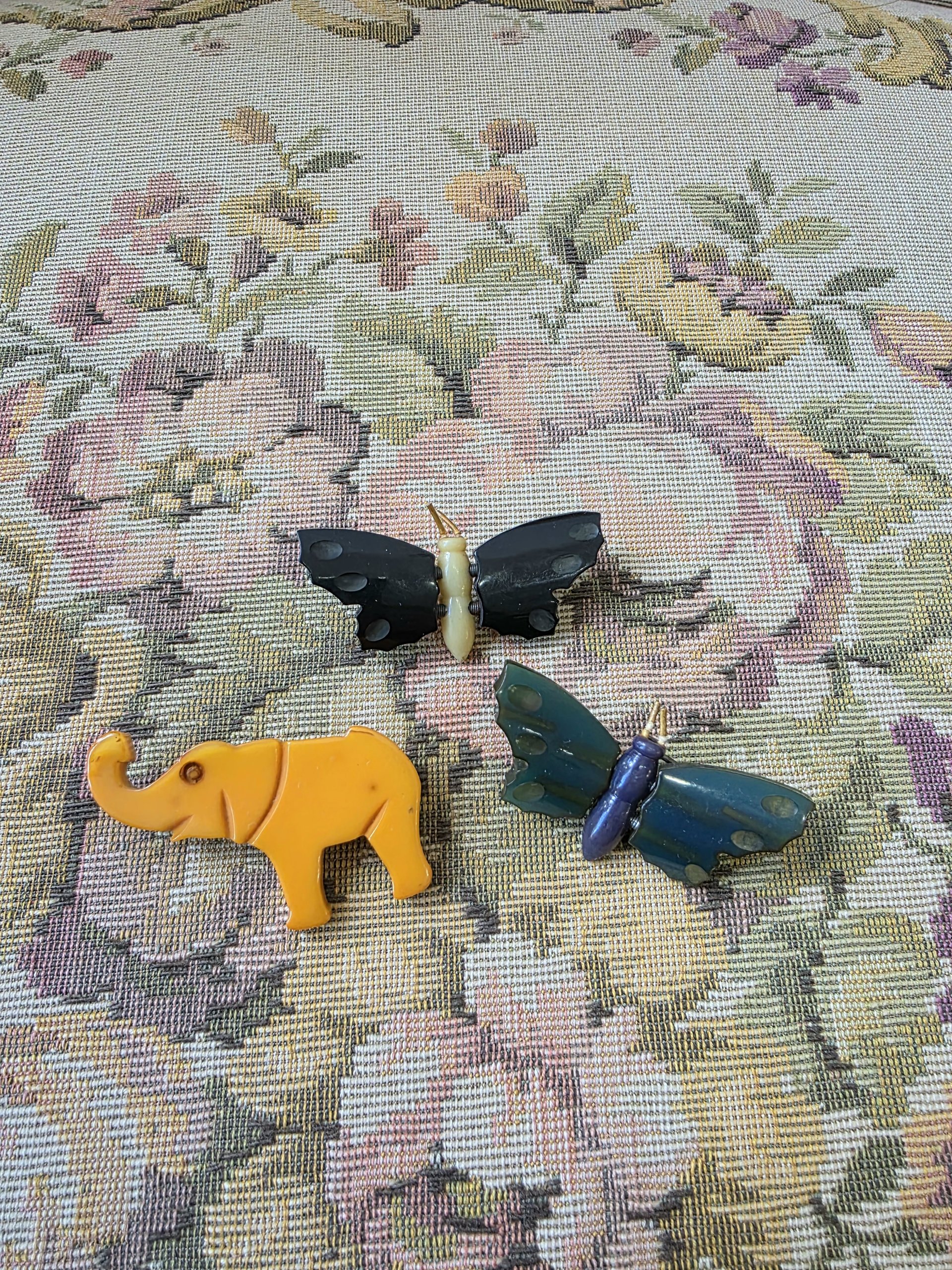 Bakelite butterfly and elephant pins, choose one