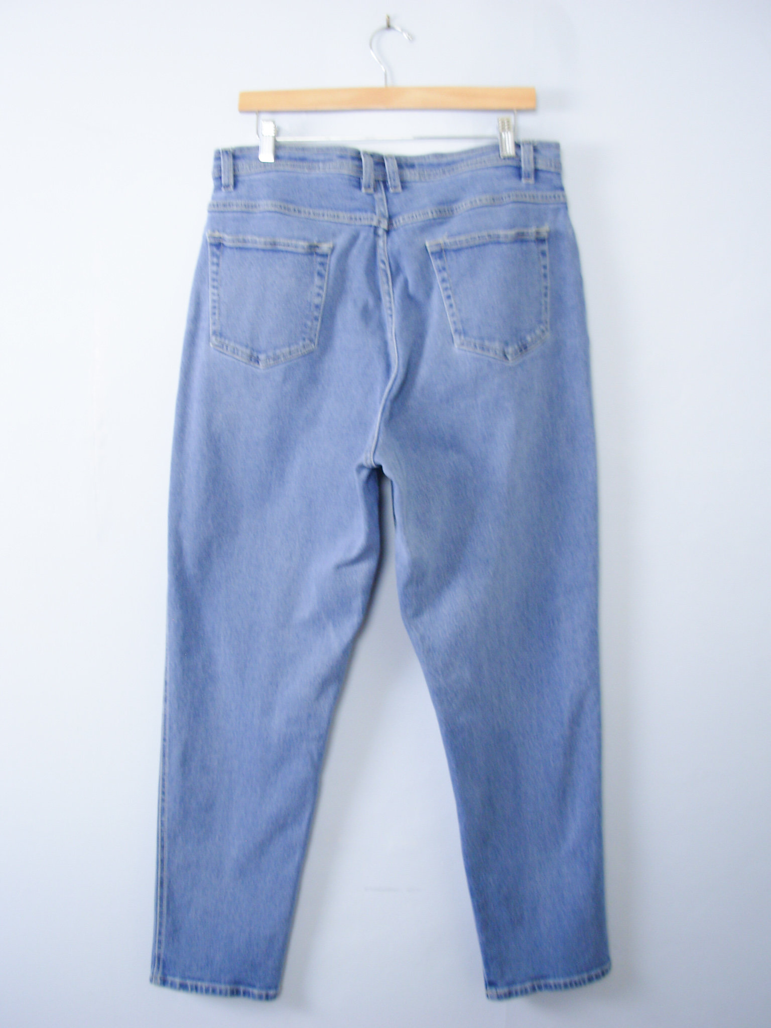 Vintage 90's light blue denim high waisted mom jeans with tapered leg, women's size 16