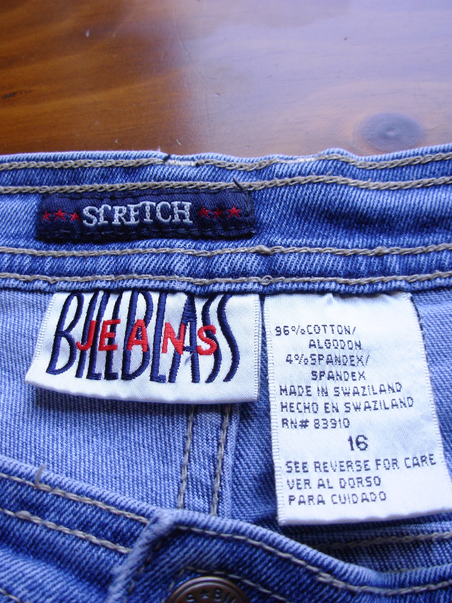 Vintage 90's light blue denim high waisted mom jeans with tapered leg, women's size 16
