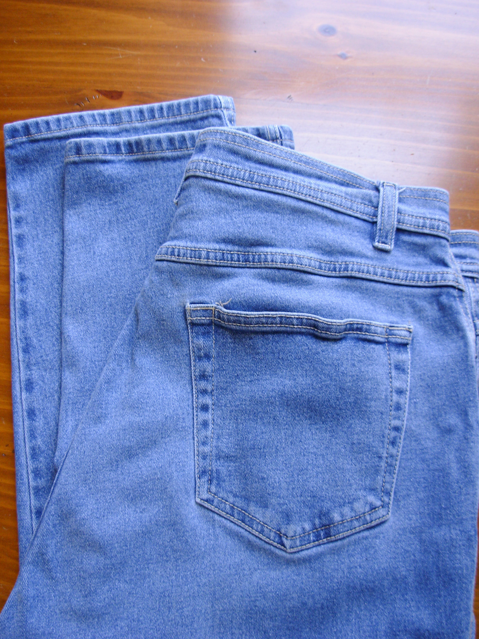 Vintage 90's light blue denim high waisted mom jeans with tapered leg, women's size 16