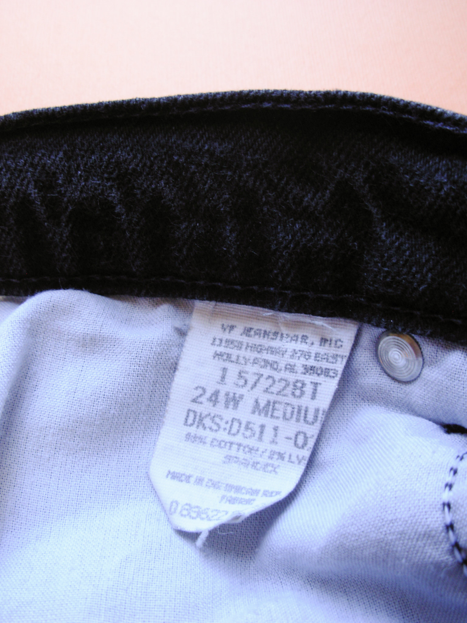 Vintage 90's high waisted black jeans with tapered leg, plus sized women's size 24 / 22